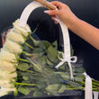 Load image into Gallery viewer, A dozen rosSurprise your loved ones with a unique design and fresh fragrant flowers for any special occasion. Send flowers right from our online catalog to make sure you send the right gift and/or the right bouquet to surprise someone special. Whether it is a get well flower gift basket, Mother's Day flowers, seasonal centerpiece for the holidays or something that says "I love you" Flower Petal Boutique is the leading florist in Las Vegas, NV and will make sure to send quality flowers.