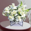 Load image into Gallery viewer, An elegant condolence floral arrangement featuring a harmonious blend of [describe flowers, e.g., white lilies, roses, and greenery], artfully arranged to convey sympathy and peace. The blooms are presented in a [describe container, e.g., standing spray, wreath, or decorative basket], symbolizing eternal love and remembrance
