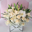 Load image into Gallery viewer, A heartfelt sympathy floral arrangement featuring white lilies, soft roses, and fresh greenery], beautifully designed to offer comfort and remembrance during difficult times. Available for same-day delivery to ensure your condolences arrive prompt
