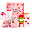 Load image into Gallery viewer, Valentine's Day gift set with pink box, candle, scrunchie, and small plant-shaped item.
