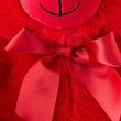 Load image into Gallery viewer, Close-up of a red plush toy with a large bow
