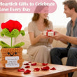 Load image into Gallery viewer, Heartfelt gift of a red rose in a knitted pot with a couple in the background exchanging gifts.
