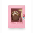 Load image into Gallery viewer, Pink Cupcake Surprise milk chocolate treat box with a clear window showing a chocolate cupcake and a small beige cupcake insert, on a white background.
